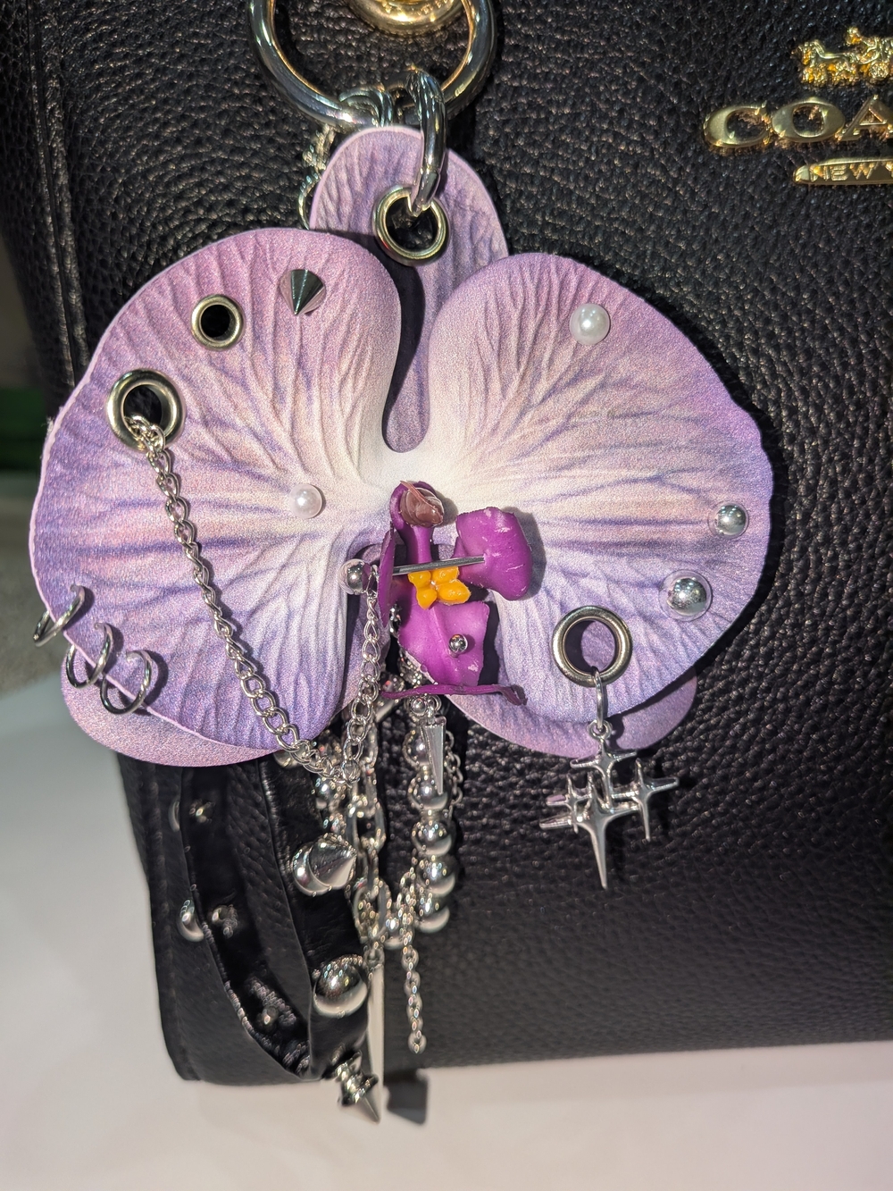 Purple Orchid Charm Keychain with Silver And Black Accents
